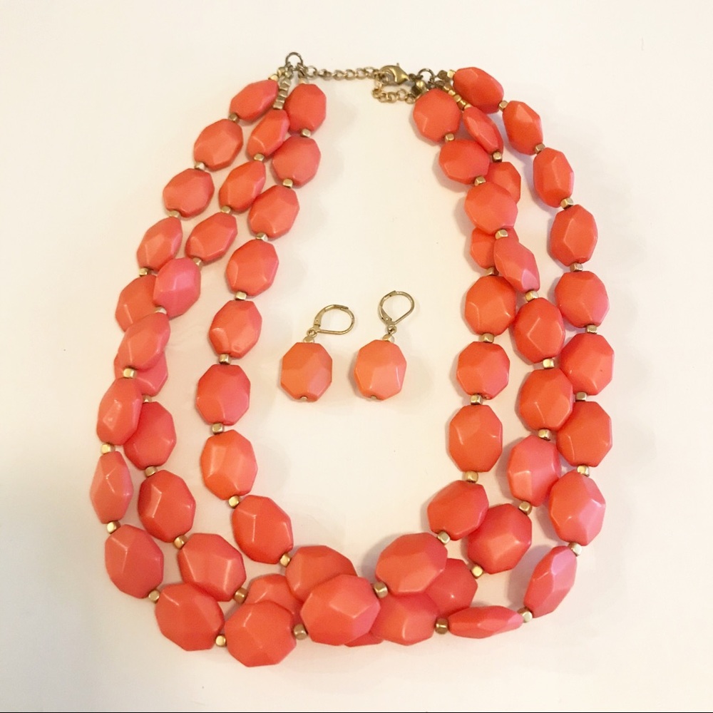 Coral colored necklace and earrings
